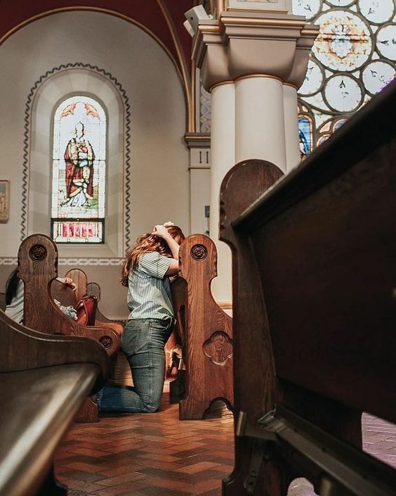 Prayer in a church pew